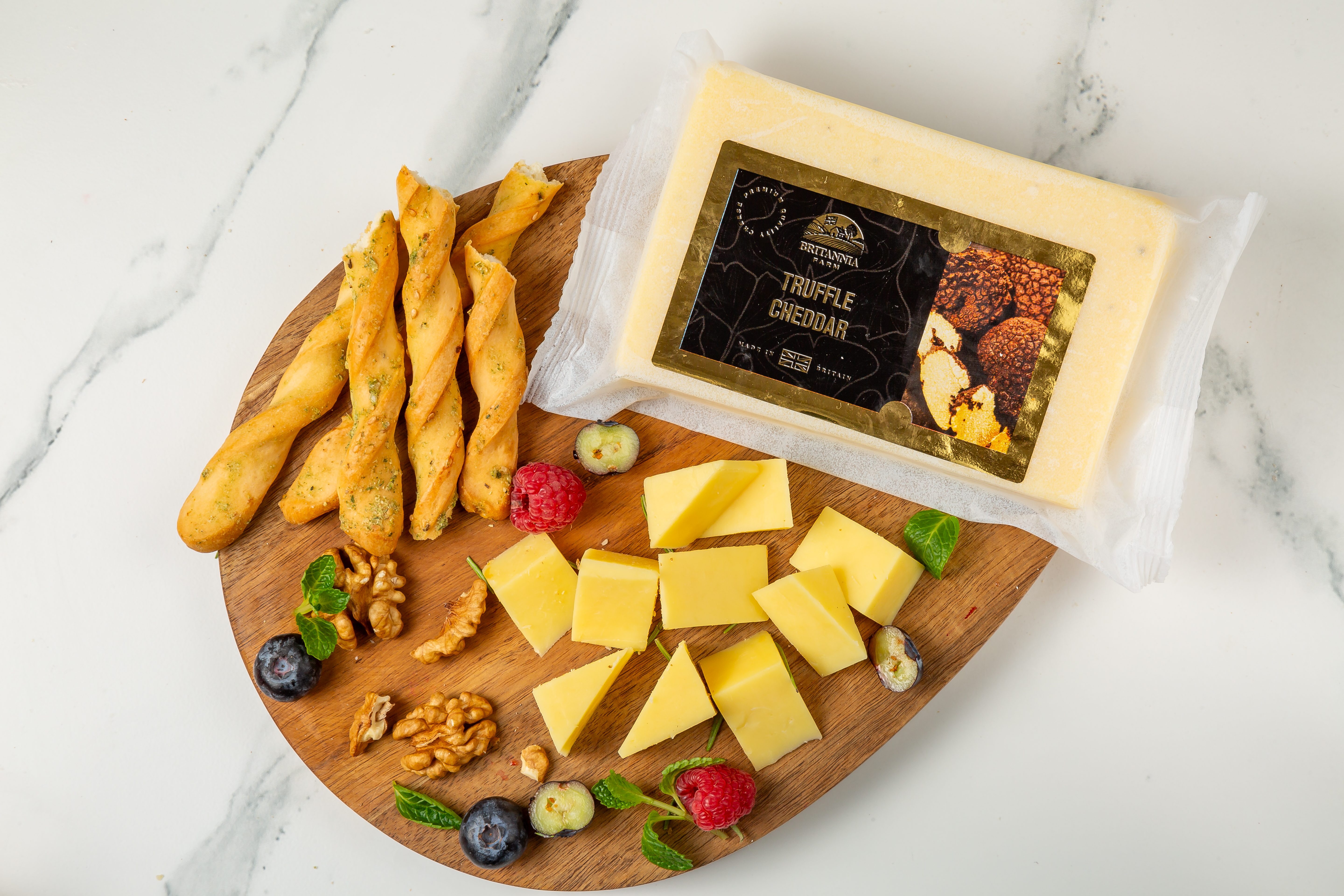 Truffle Cheddar cheese block infused with black truffle – premium British cheese