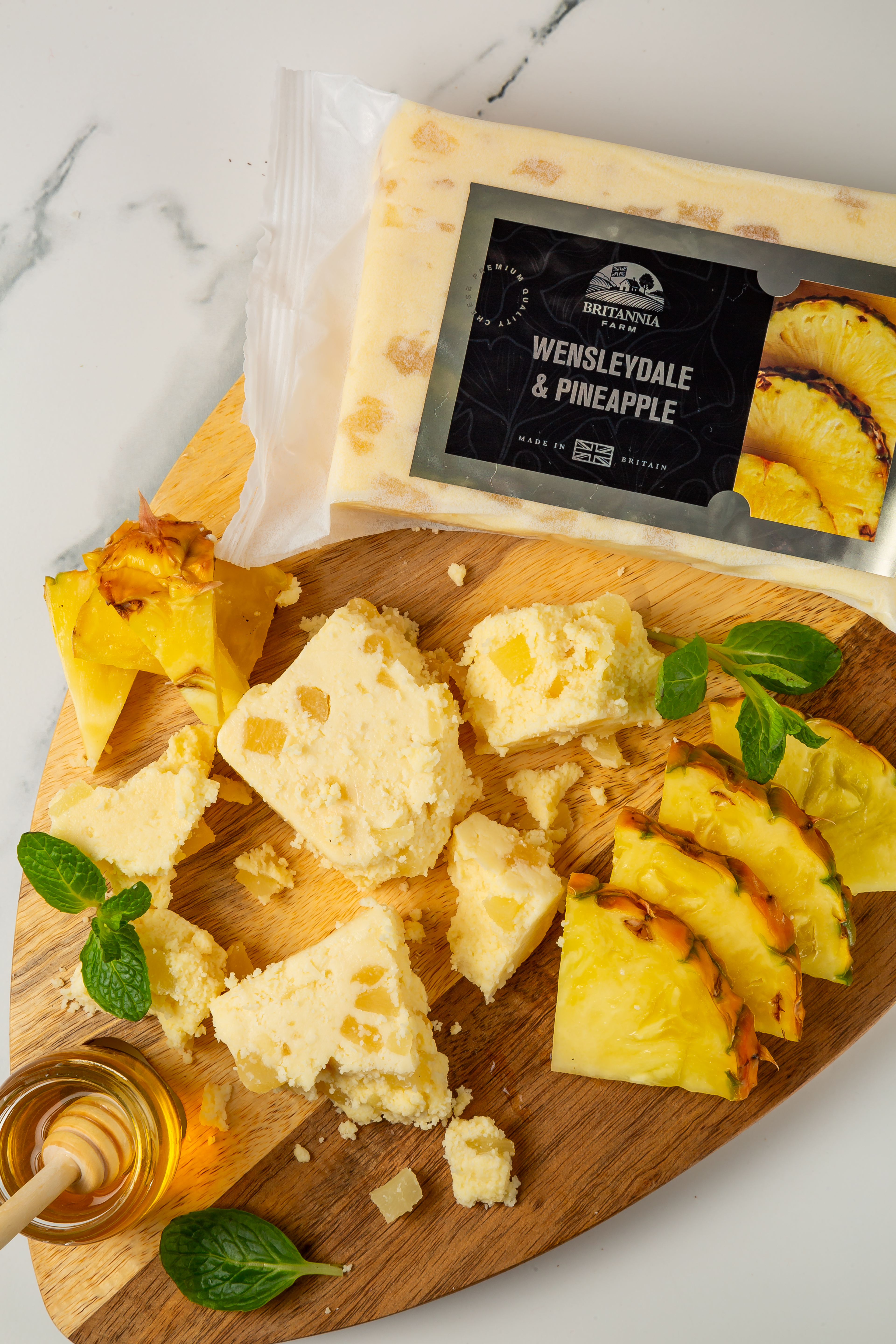 Wensleydale & Pineapple cheese with tropical fruit pieces – British blended cheese