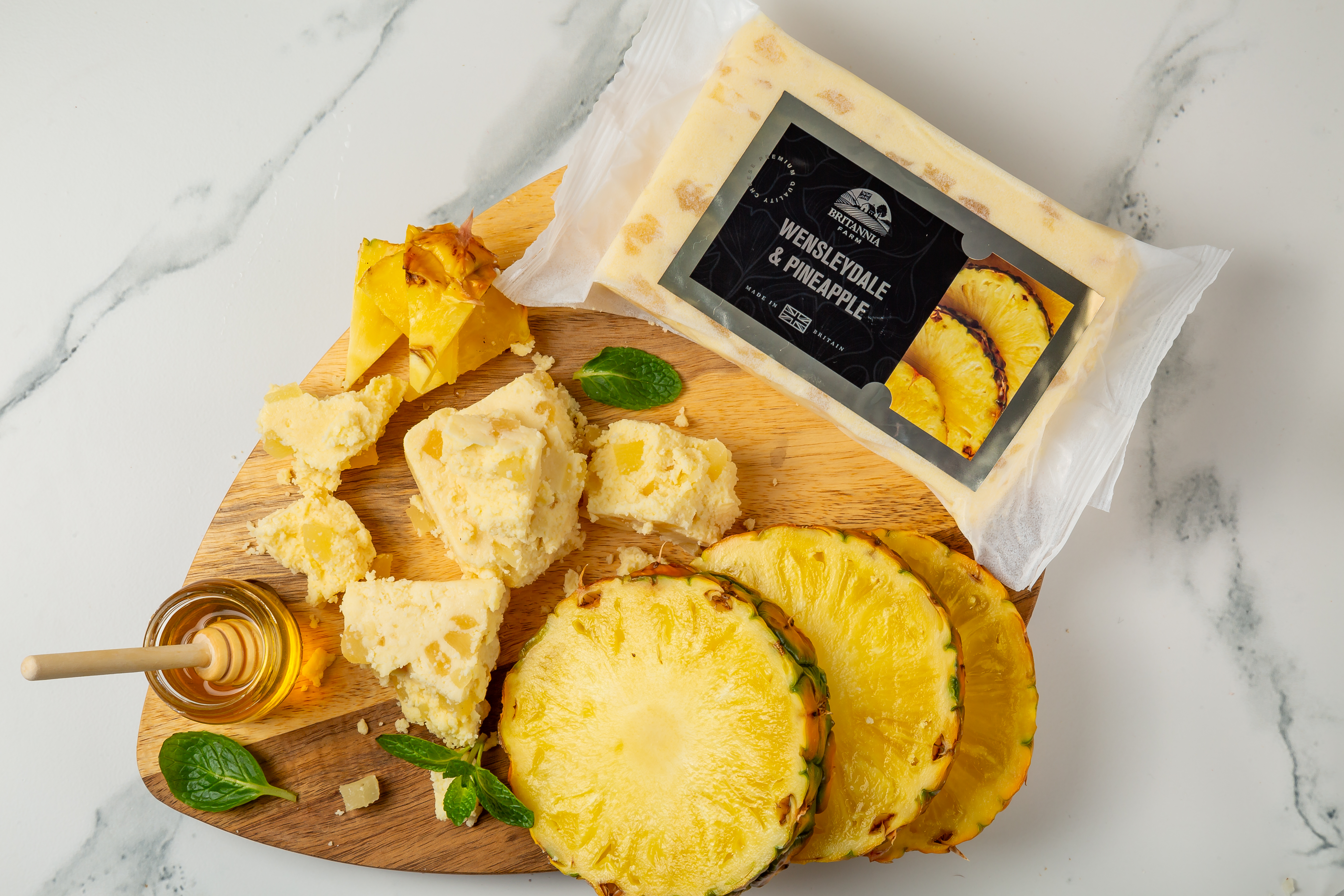Wensleydale & Pineapple cheese with tropical fruit pieces – British blended cheese